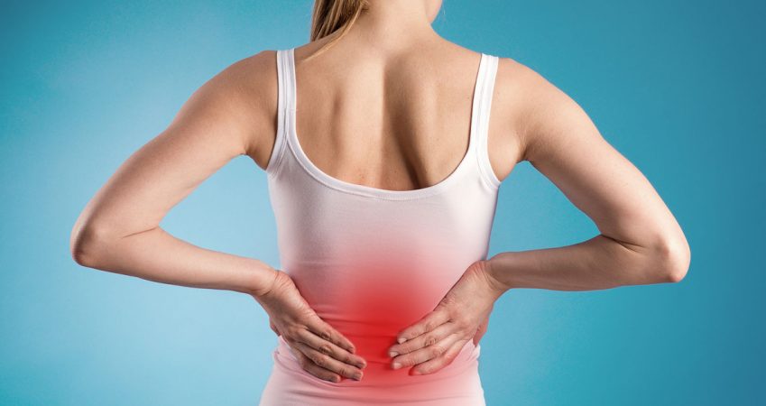 Why does herniated disc pain worsen at night?
